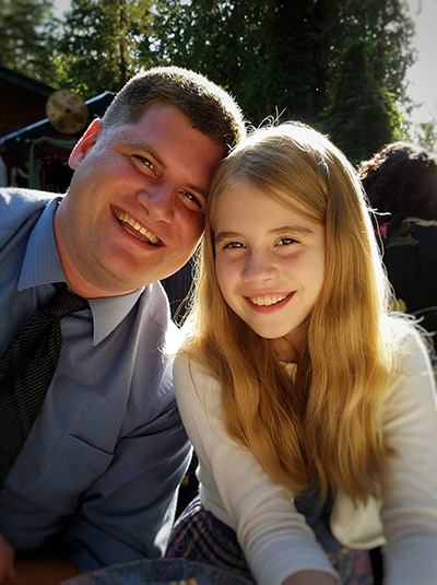 Greg with his daughter Rachel in the warm summer
