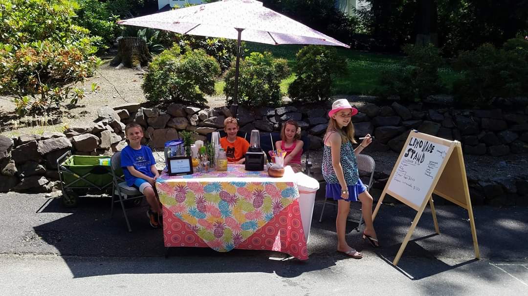 Matt and friends running a lemonade stand