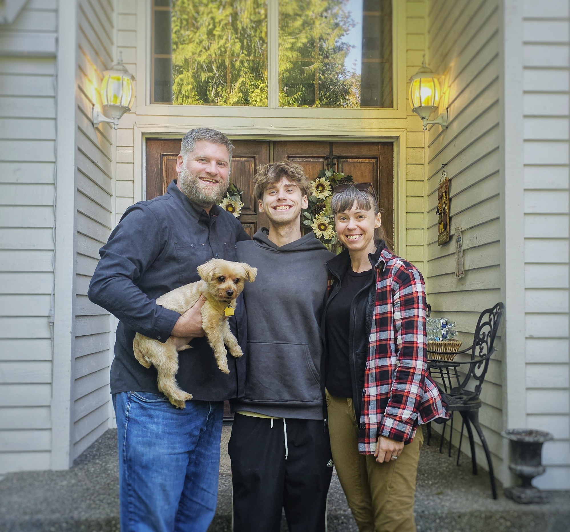 Matt standing with Karen, Greg & Puppycorn